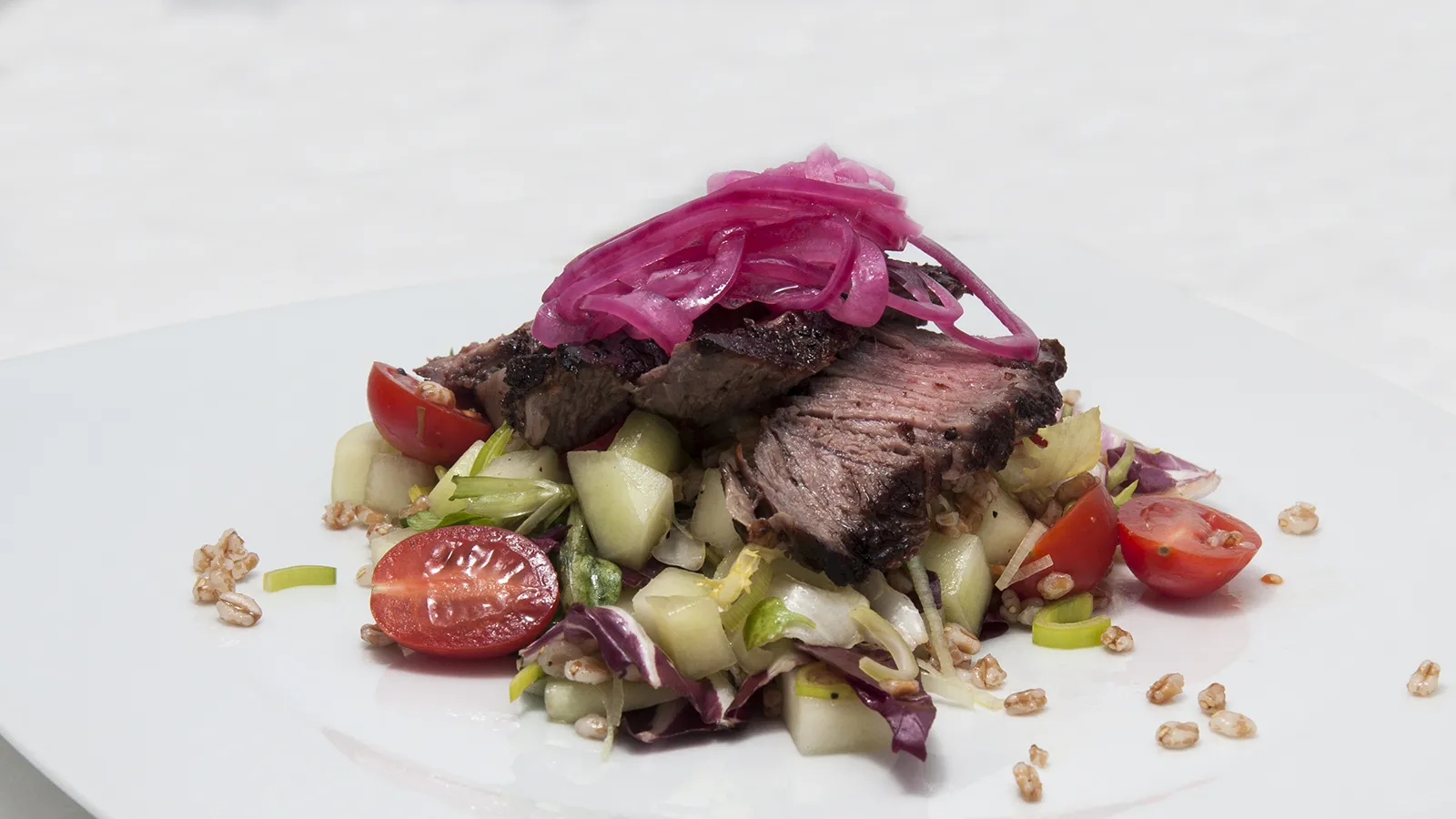 Wheat berry salad with melon and ribeye