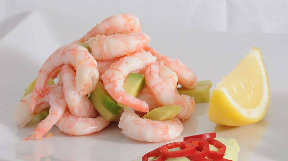 Shrimp Cocktail with Avocado Mousse, Chilli and a Lemon Wedge