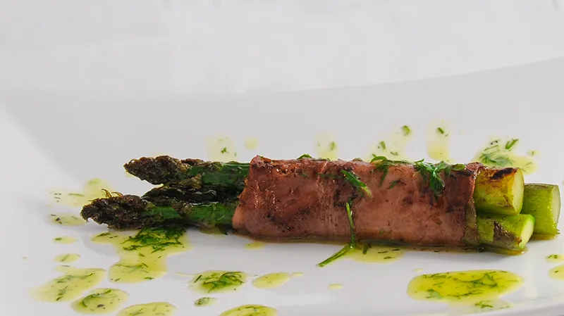 Butter-Sautéed Asparagus Wrapped in Air-Dried Ham with Dill Oil